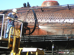 Man Cleaning The Train